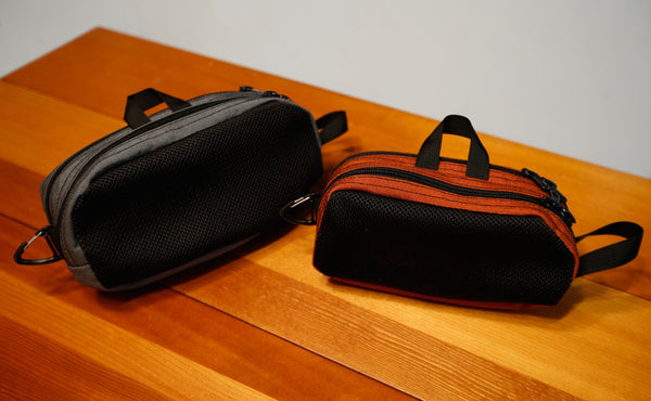 A Large Snake Charmer next to a Small Snake Charmer.